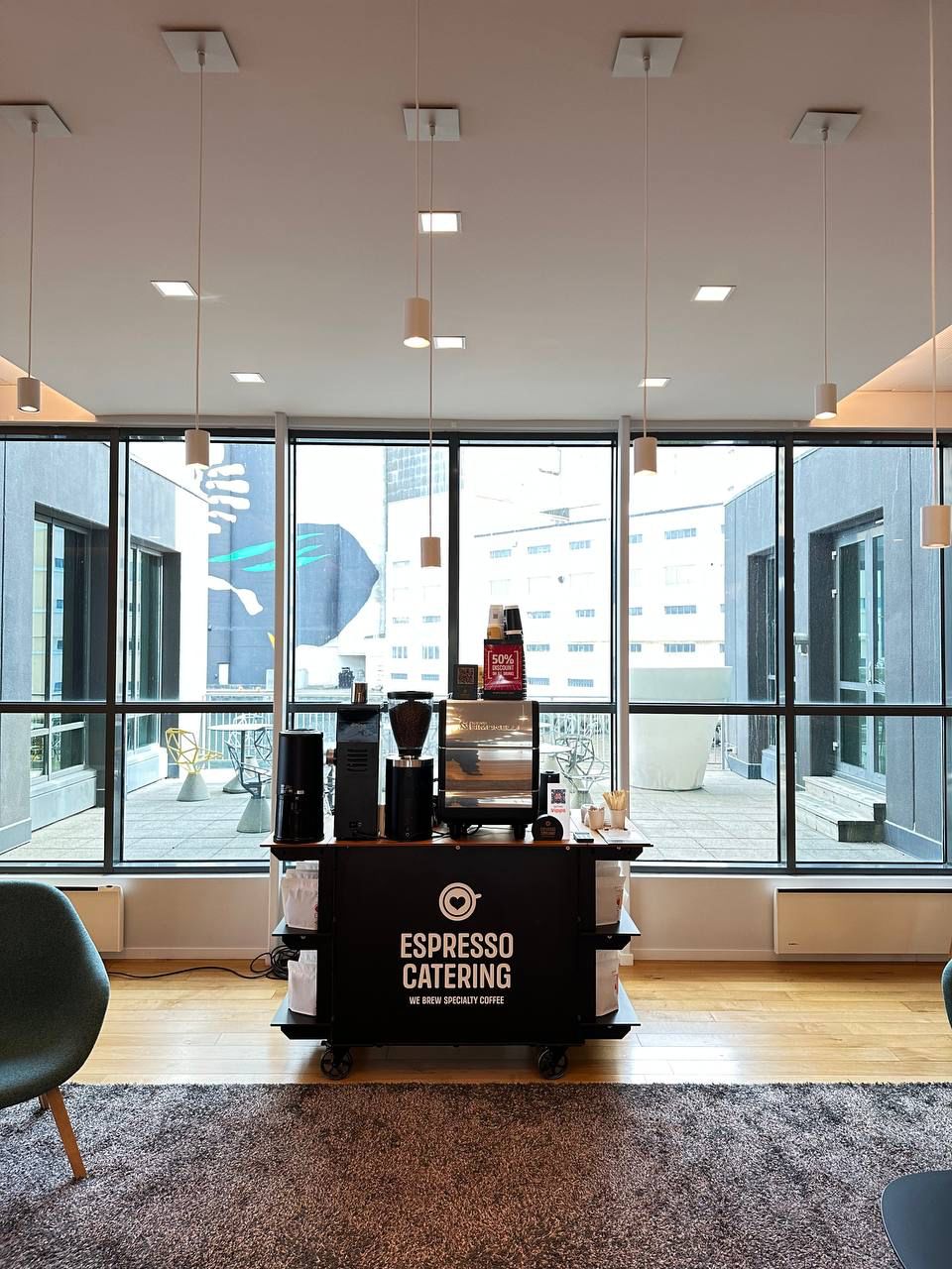 Espresso Catering AS coffee stand inside the modern interior of the building at Badehusgata 37, offering a professional espresso bar experience with premium coffee.