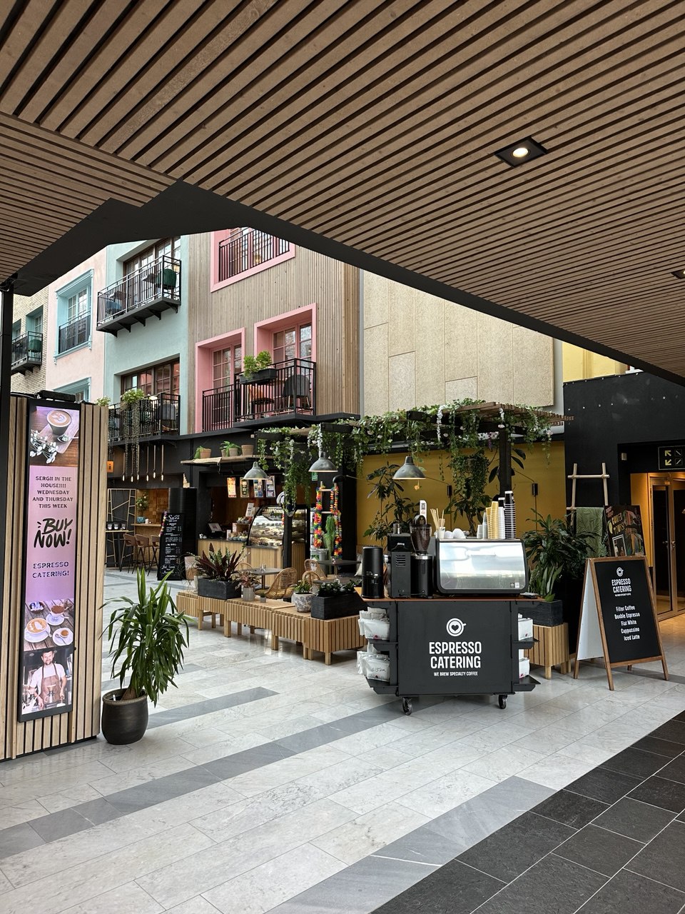 The Espresso Catering coffee stand with a professional espresso bar pops up every Wednesday at FOMO WORKS from 8 AM to 2 PM, serving premium coffee.